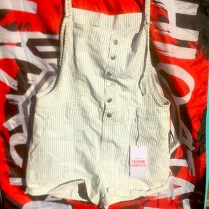 8S3.  Celebrity Pink overalls